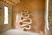 DIGNE LES BAINS  FRANCE: RED CLAY SCULPTURE BY ANDY GOLDSWORTHY IN THE MOUNTAIN REFUGE OF VIEIL ESCLANGON