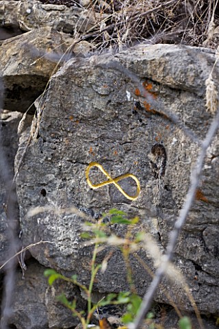 DIGNE_LES_BAINS__FRANCE_GOLD_INFINITY_SIGN_IN_ROCK_BY_HERMAN_DE_VRIES