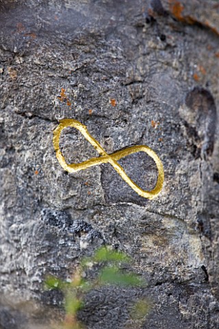 DIGNELESBAINS__FRANCE_GOLD_INFINITY_SIGN_IN_ROCK_BY_HERMAN_DE_VRIES