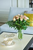 VILLA GIUSEPPINA  LAKE COMO  ITALY - ROSES IN A VASE ON TABLE IN THE SITTING ROOM