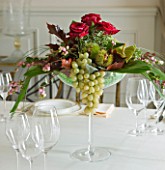 VILLA GIUSEPPINA  LAKE COMO  ITALY - GLASS VASE OF FLOWERS IN THE DINING ROOM