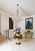 VILLA GIUSEPPINA  LAKE COMO  ITALY - THE ENTRANCE HALL WITH LARGE BOUQUET OF FLOWERS
