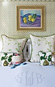 DESIGNER BUTTER WAKEFIELD  LONDON - CUSHIONS ON BED WITH PICTURE ON WALL - BEDROOM