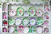 DESIGNER BUTTER WAKEFIELD  LONDON - THE CONSERVATORY - PLATES IN CUPBOARD ON WALL