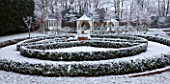FORMAL TOWN GARDEN IN SNOW  OXFORD  WINTER: DESIGN BY LIZ NICHOLSON - SUMMERHOUSE AND GAZEBOS/ ARBOURS WITH LOW BOX EDGED BEDS