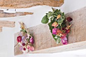 DESIGNER CAROLYN MINTY  GLOUCESTERSHIRE - THE DINING ROOM - DRIED ROSES ON THE BEAMS