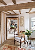 DESIGNER CAROLYN MINTY  GLOUCESTERSHIRE - VIEW THROUGH THE SITTING ROOM INTO THE DINING ROOM