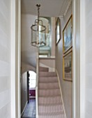DESIGNER JANE CHURCHILL : STAIRCASE AND COACH LAMP IN HALLWAY