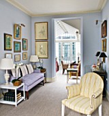 DESIGNER JANE CHURCHILL : THE DRAWING ROOM WITH LIGHT FILLED CONSERVATORY AT THE END