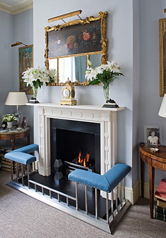 DESIGNER_JANE_CHURCHILL__THE_DRAWING_ROOM__MODERN_FIREPLACE_WITH_ANTIQUE_FRENCH_CLOCK__ANTIQUE_SHOP_