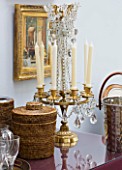 DESIGNER JANE CHURCHILL : DRINKS TABLE IN THE CONSERVATORY  WITH 19TH CENTURY ORMOLU CANDLESTICK