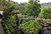 GARDEN OF PAOLO PEJRONE  ITALY: CLIPPED TOPIARY SHAPES VIEWED FROM THE HOUSE