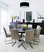 CAKE BOY HOUSE  LONDON: DINING TABLE WITH CIRCULAR TABLE AND SIDEBOARD