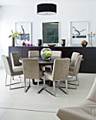 CAKE BOY HOUSE  LONDON: DINING TABLE WITH CIRCULAR TABLE AND SIDEBOARD