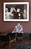 CAKE BOY HOUSE  LONDON: ICE SCULPTURE MADE OF GLASS  BY SCULPTOR BRUCE DENNY  ON A CHEST OF DRAWERS IN BEDROOM . ABOVE IS A PHOTOGRAPH OF ANDY WARHOL