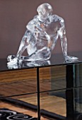 CAKE BOY HOUSE  LONDON: ICE SCULPTURE MADE OF GLASS  BY SCULPTOR BRUCE DENNY  ON A CHEST OF DRAWERS IN BEDROOM