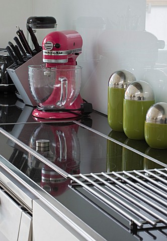 CAKE_BOY_HOUSE__LONDON_CLOSE_UP_OF_KITCHENAID_CAKE_MIXER_AND_UTENSILS_ON_WORK_SURFACE_IN_KITCHEN