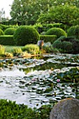 LES CONFINES  PROVENCE  FRANCE - DESIGNER: DOMINIQUE LAFOURCADE - THE WATERLILY POND FROM THE GRAVEL TERRACE BESIDE THE HOUSE