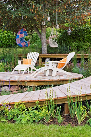 DECKING_PROJECT__DESIGNER_CLARE_MATTHEWS__CIRCULAR_DECKS_WITH_WALKWAY__DECK_CHAIRS_AND_HANGING_CHAIR