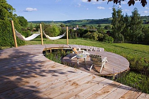 DECKING_PROJECT__DESIGNER_CLARE_MATTHEWS__CIRCULAR_DECK_WITH_WALKWAY__DECK_CHAIRS_AND_HAMMOCKS