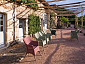PRIEURE NOTRE-DAME DORSAN  FRANCE: CHAIRS ON TERRACE BY THE SHOP