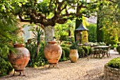 DESIGNER MICHEL SEMINI  PROVENCE  FRANCE: MAS THEO - GRAVEL COURTYARD WITH TERRACOTTA CONTAINERS