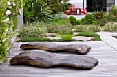 DESIGNER DOMINIQUE LAFOURCADE  PROVENCE  FRANCE: DECKING BESIDE THE SWIMMING POOL WITH CHAISE -LONGUES IN WOOD BY MARC NUCERA