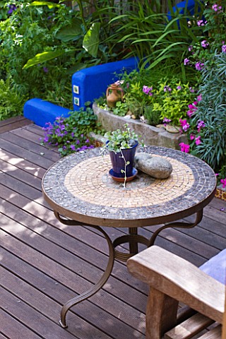 KARLA_NEWELL_GARDEN__BRIGHTON_SMALL_TOWN_GARDEN__DECKED_TERRACE_WITH_MOSAIC_TABLE_AND_BLUE_RENDERED_