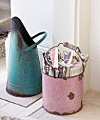 AMANDA KNOX HOUSE  GRANTHAM: THE WHITE SITTING ROOM - VINTAGE ENAMEL COAL SCUTTLE IN TURQOISE AND PEELING PINK BUCKET FOR NEWSPAPER KINDLING   BY FIREPLACE