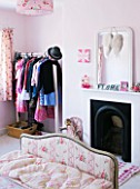 AMANDA KNOX HOUSE  GRANTHAM: CHILDRENS BEDROOM IN PALE PINK WITH VINTAGE BED  FIREPLACE AND MIRROR