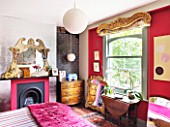 CHANTAL COADY HOUSE  LONDON: A ROCOCO OVERMANTEL AND THEATRICAL PELMET AT THE WINDOW SETS THE TONE I THE QUIRKY MAIN BEDROOM