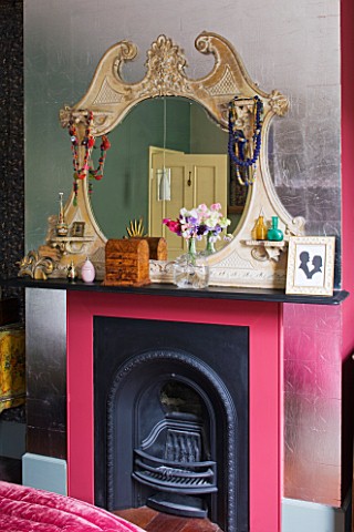 CHANTAL_COADY_HOUSE__LONDON_A_ROCOCO_OVERMANTEL_AND_PINK_FIREPLACE_IN_THE_MAIN_BEDROOM