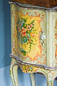 CHANTAL COADY HOUSE  LONDON: A BEAUTIFULLY PAINTED FRENCH 1930S CUPBOARD IN THE MAIN BEDROOM - A GIFT FROM A FRIEND