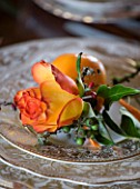 FULBROOK HOUSE: DINING ROOM PLACE SETTING WITH WHITE AND GOLD CHINA  ORANGE/YELLOW ROSE AND SEASONAL FOLIAGE