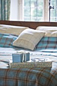 FULBROOK HOUSE: MASTER BEDROOM; BED WITH AQUA PLAID WOOL THROW FROM COTSWOLD WOOLLEN WEAVERS