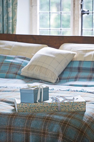 FULBROOK_HOUSE_MASTER_BEDROOM_BED_WITH_AQUA_PLAID_WOOL_THROW_FROM_COTSWOLD_WOOLLEN_WEAVERS
