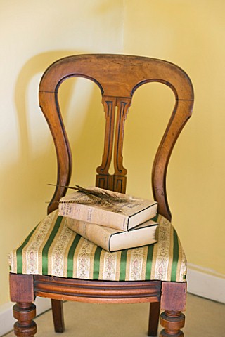 FULBROOK_HOUSE_YELLOW_DOUBLE_BEDROOM__ANTIQUE_POLISHED_WOOD_CHAIR_WITH_GOLD_AND_GREEN_STRIPE_FABRIC_