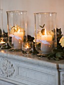 WHITE HOUSE: RECEPTION ROOM: DECORATIVE MARBLE FIREPLACE WITH WHITE ROSES AND CANDLES