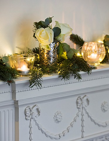 WHITE_HOUSE_DINING_ROOM__DECORATIVE_WHITE_MANTLE_PIECE_DRESSED_FOR_CHRISTMAS_WITH_PINE__EUCALYPTUS__
