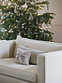 WHITE HOUSE: FAMILY ROOM - WHITE SETTEE WITH CHRISTMAS TREE BEHIND