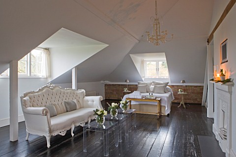 WHITE_HOUSE_ATTIC_GUEST_BEDROOM_WHITE_WITH_DARK_WOOD_FLOORING__DOUBLE_BED_AND_WHITE_BUTTONED_FRENCH_