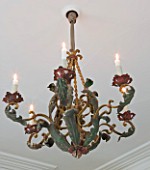 SARAH BAKERS HOUSE  THE OLD VICARAGE  SOMERSET: SITTING ROOM; VINTAGE METAL CEILING CANDELABRA IN GREEN RED AND GOLD.