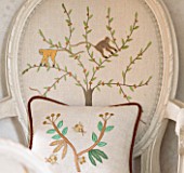 SARAH BAKERS HOUSE  THE OLD VICARAGE: DINING ROOM; EXAMPLE OF BESPOKE BAKER AND GRAY EMBROIDERY ON BACK OF CHAIR