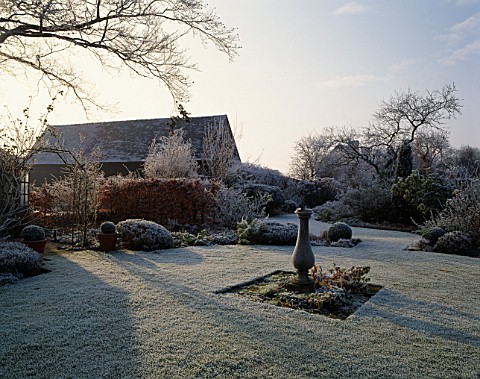 FROST_COVERED_ROSE_GARDEN_WITH_SUNDIAL_AND_DUTCH_BARN_C1700_WOLLERTON_OLD_HALL__SHROPSHIRE