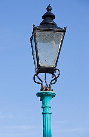 HERM_ISLAND__CHANNEL_ISLANDS__OLD_CAST_IRON_LIGHT_BESIDE_THE_QUAY