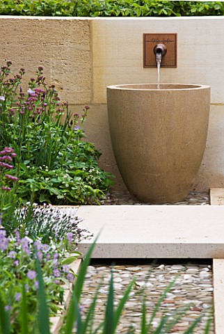 CHELSEA_2012__LAURENT_PERRIER_GARDEN_BY_ARNE_MAYNARD__WALL_WATER_SPOUT_FALLING_INTO_LARGE_CONTAINER
