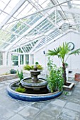 GRANGE COURT  GUERNSEY: FOUNTAIN IN THE RESTORED GLASSHOUSE