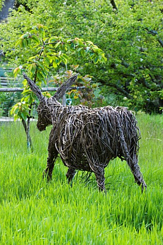MILLE_FLEURS__GUERNSEY_WOVEN_WILLOW_DONKEY_IN_GRASS