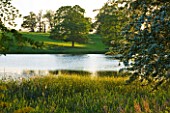 DUDMASTON ESTATE  SHROPSHIRE. THE NATIONAL TRUST. MAY 2012 -  VIEW ACROSS THE LAKE AT SUNSET