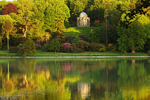 STOURHEAD_LANDSCAPE_GARDEN__WILTSHIRE_THE_NATIONAL_TRUST_MAY_2012__PANORAMIC_SUNSET_VIEW_ACROSS_LAKE